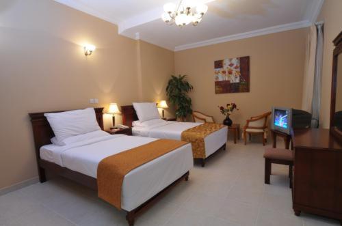 Le Grand Hotel Ντόχα Δωμάτιο φωτογραφία